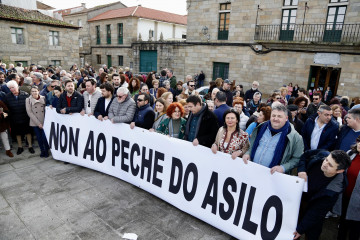 Pancarta concentración asilo cambados